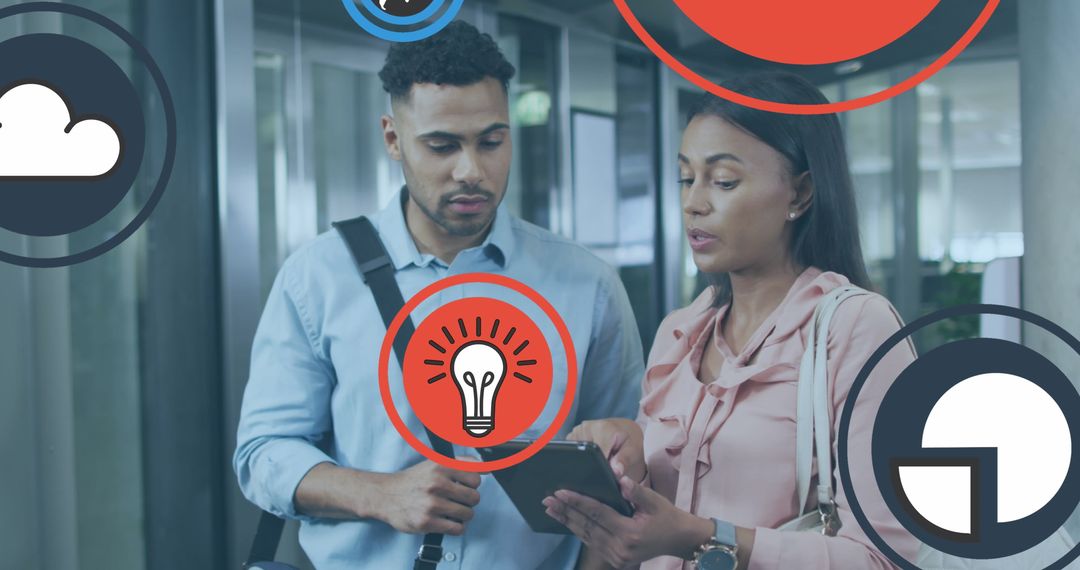 Coworkers Discussing Project Strategy in Modern Office