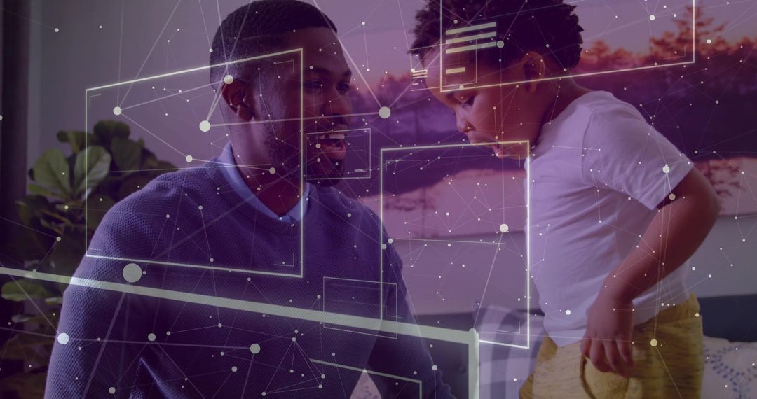 Father and Son Viewing Network Overlay on Monitor