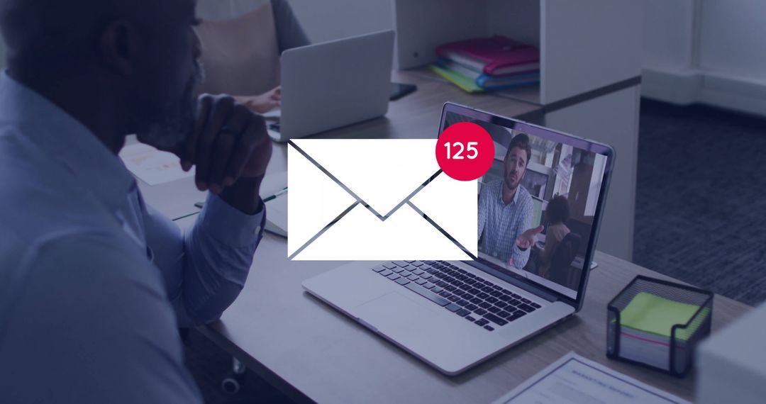 Businessman Viewing Email Alert Overlay During Video Call in Office