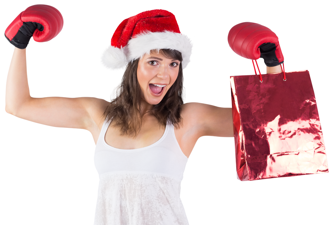 Woman Wearing Boxing Gloves And Santa Hat Holding Transparent Shopping Bag - Download Free Stock Images Pikwizard.com