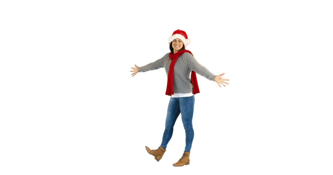 Joyful woman wearing Santa hat and winter clothes isolated on white background - Free Images, Stock Photos and Pictures on Pikwizard.com