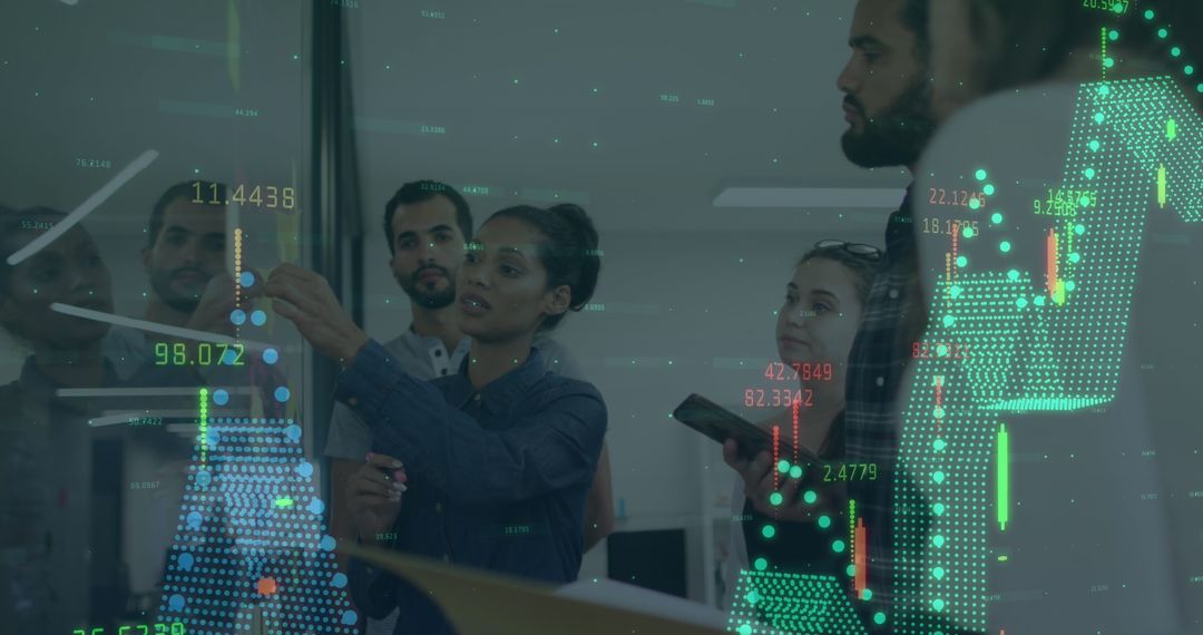 Innovative Diverse Team Analyzing Digital Data in Modern Office