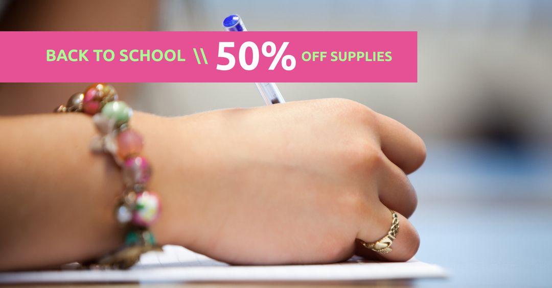 Student Hand Preparing for School Year with Discount Offer