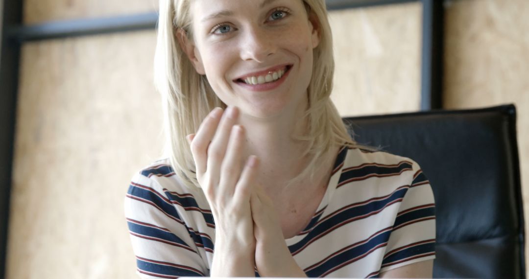 Smiling Young Woman Applauding in Casual Outfit, Celebratory Moment - Free Images, Stock Photos and Pictures on Pikwizard.com