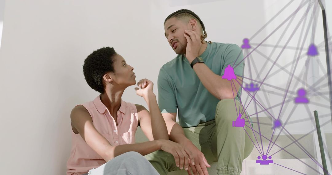 Couple Discussing on Stair Landing with Digital Network Overlay Representing Connectivity