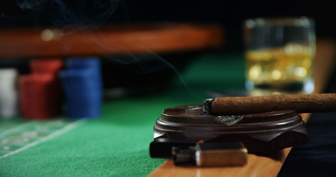 Smoking Cigar While Drinking Whiskey at Poker Table - Free Images, Stock Photos and Pictures on Pikwizard.com