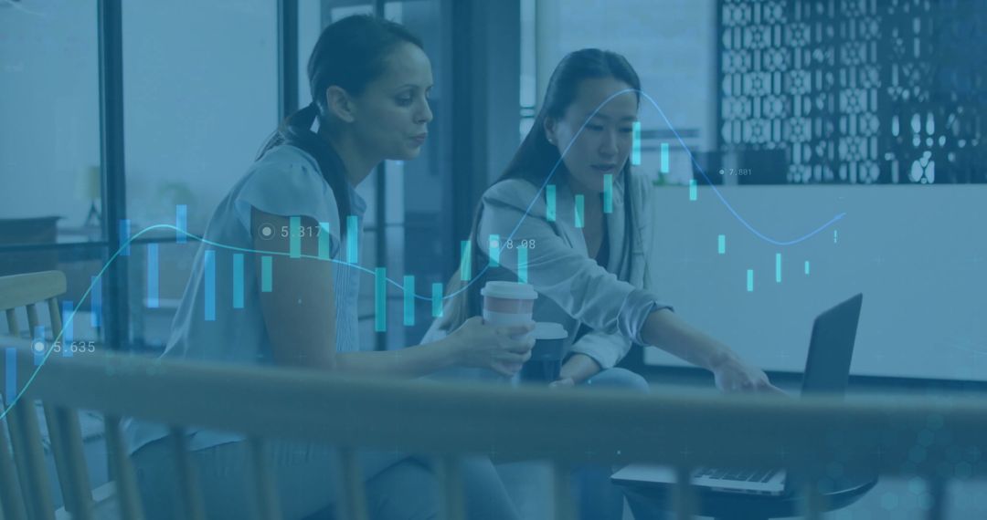 Coworkers Analyzing Data with Overlay of Financial Charts