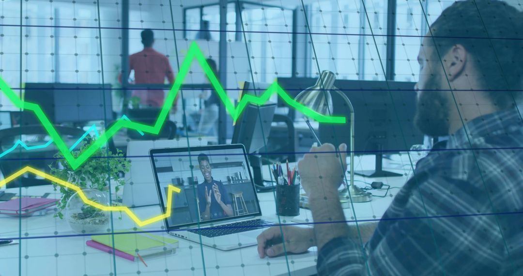 Professional in Open-Plan Office on Video Call Monitoring Data