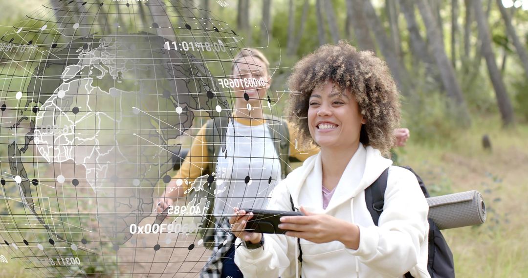 Smiling hiker holding smartphone navigating forest trail with backpack and rolled mat, AR map