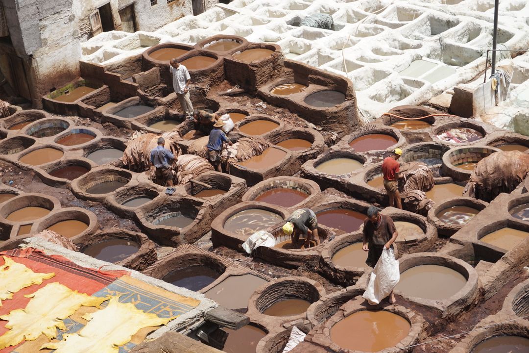 Traditional Tannery Workers in Medina - Free Images, Stock Photos and Pictures on Pikwizard.com