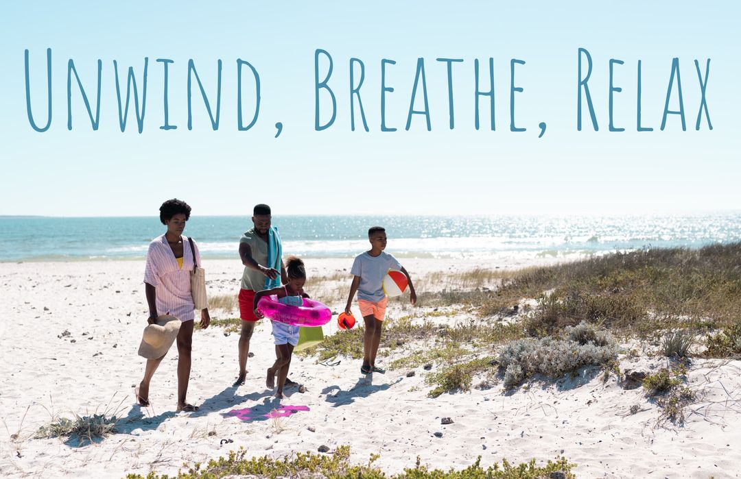 Family Walking on Sunny Beach For Relaxation and Togetherness