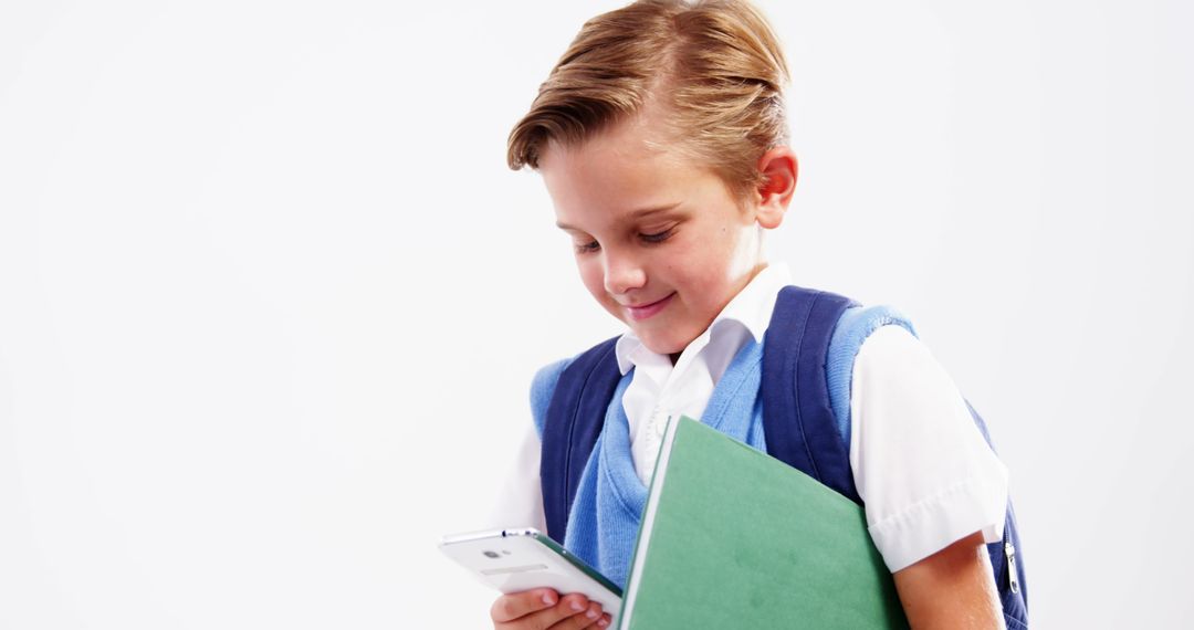 Schoolboy Using Smartphone and Backpacking for Learning