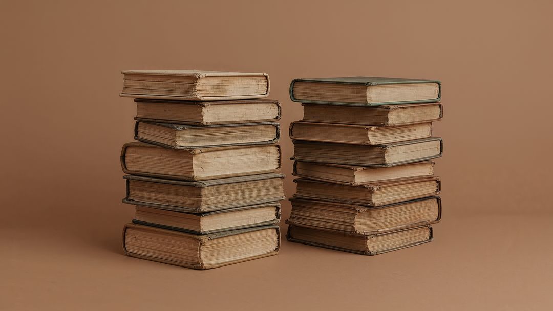 Two Stacks of Vintage Hardcover Books with Rustic Charm