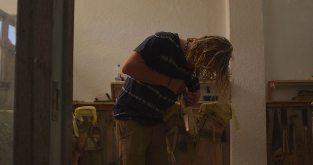 Young Craftsman Working in Workshop, Engaged in Woodworking - Free Images, Stock Photos and Pictures on Pikwizard.com