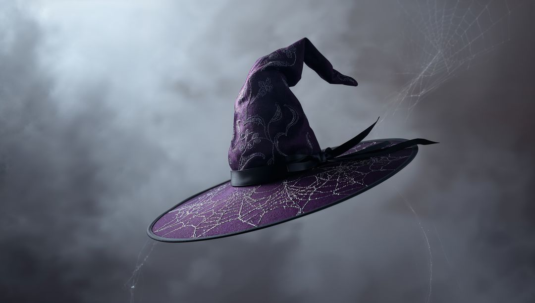 Floating Purple Witch Hat with Spiderweb Design in Misty Skies