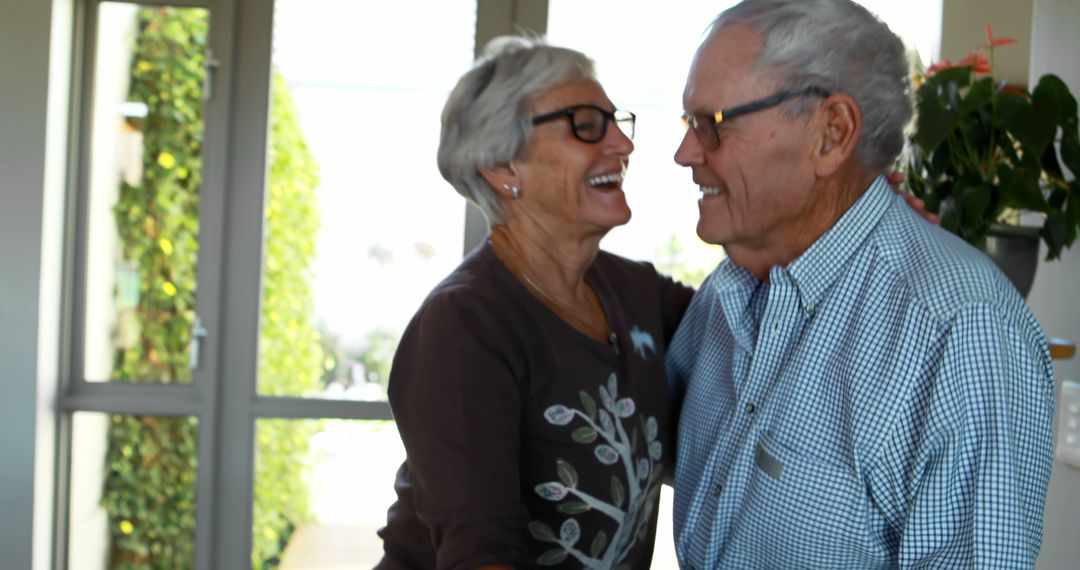 A senior couple exemplifies a deep bond through laughter and affectionate moments. - Free Images, Stock Photos and Pictures on Pikwizard.com