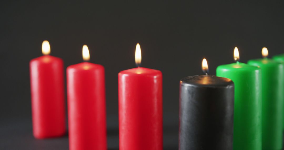 Kwanzaa Candles Lit Against Dark Background - Free Images, Stock Photos and Pictures on Pikwizard.com