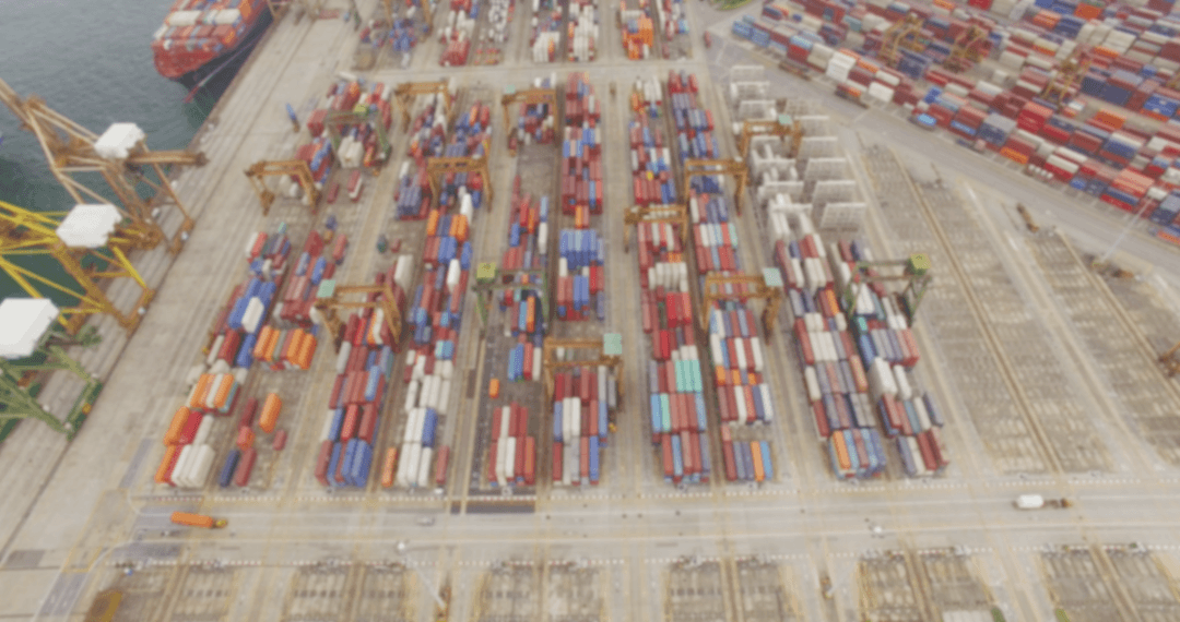 Aerial Transparent View of Containers at Commercial Dock