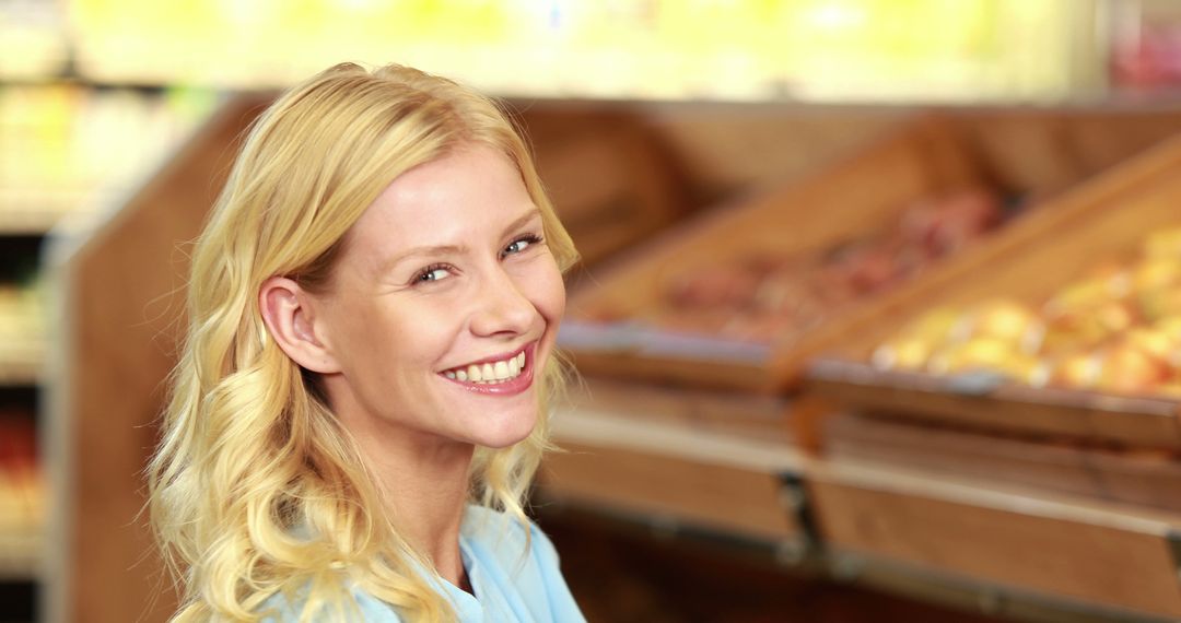 Smiling Woman Shopping for Fresh Produce in Grocery Store - Free Images, Stock Photos and Pictures on Pikwizard.com