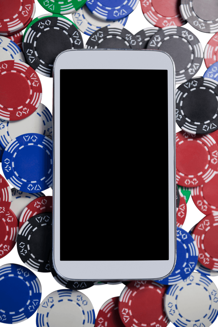 Mobile Phone Displaying Blank Screen on a Pile of Poker Chips
