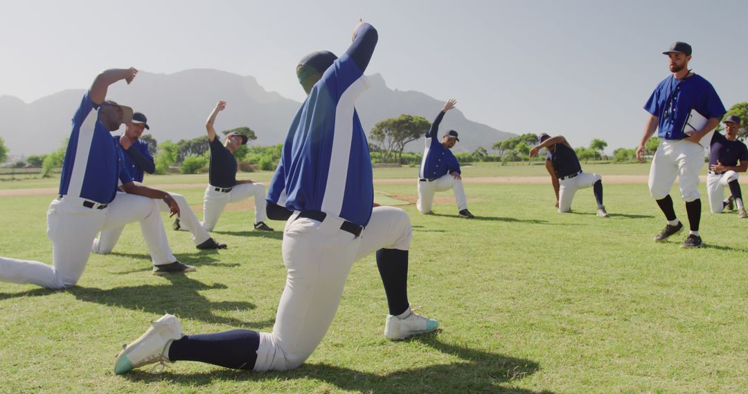 Baseball Team Stretching On Field Before Practice - Free Images, Stock Photos and Pictures on Pikwizard.com