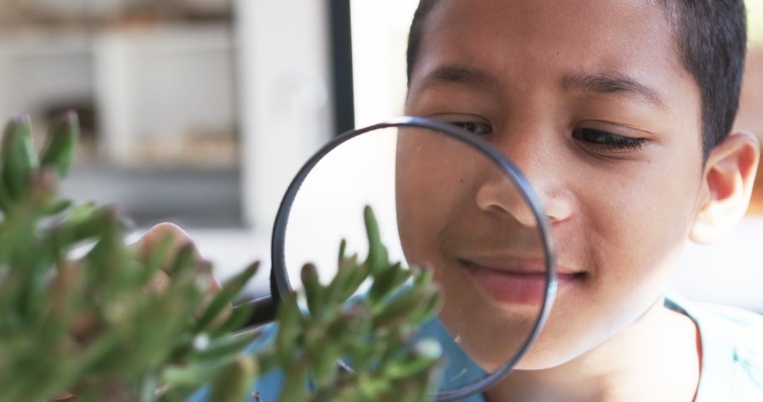 Curious Student Examining Plant Through Magnifying Glass