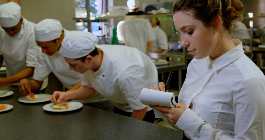 Dedication of Female Chef Evaluating Culinary Presentation