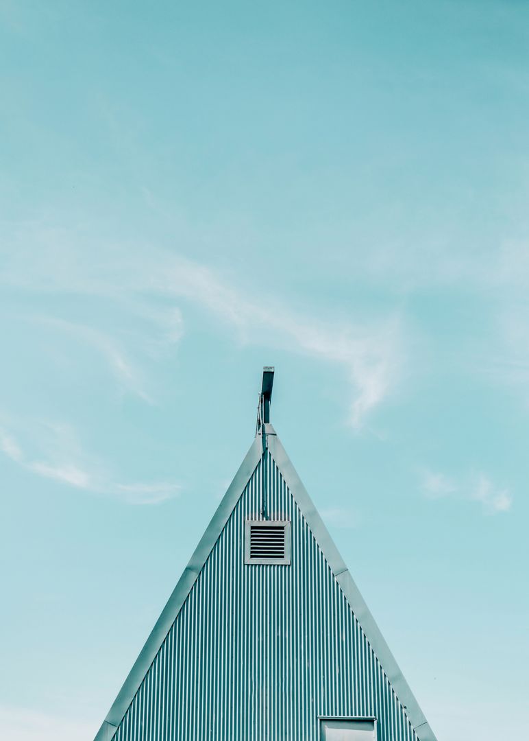 Minimalistic A-Frame House Against Blue Sky