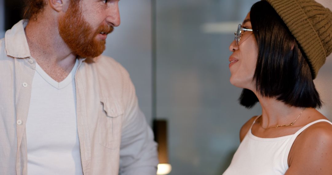 Diverse Colleagues Engaging in Collaborative Discussion with Focused Expressions