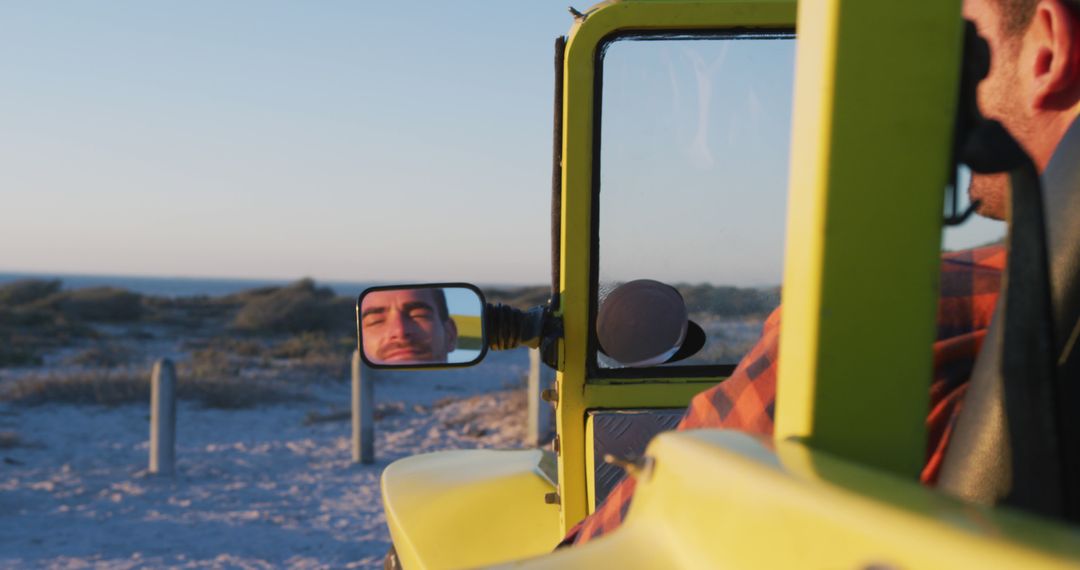 Man Driving Yellow Jeep with Scenic Beach View - Free Images, Stock Photos and Pictures on Pikwizard.com