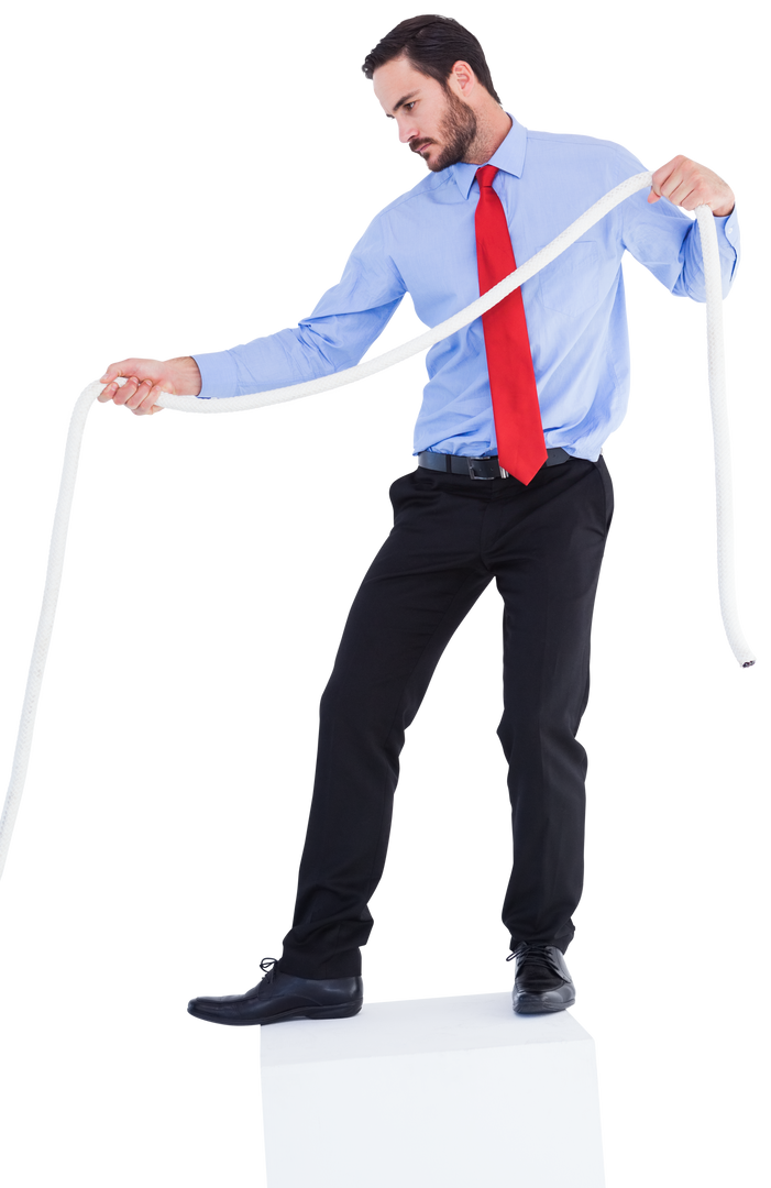 Focused Businessman Pulling a Transparent Rope with Determined Expression - Download Free Stock Images Pikwizard.com