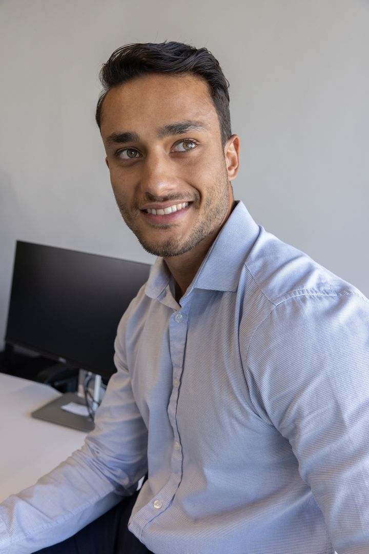 Business Professional Working on Keyboard at Minimalist Workspace