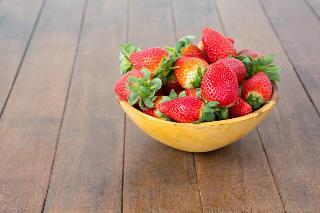 Bowl of Fresh Strawberries on Wooden Surface - Free Images, Stock Photos and Pictures on Pikwizard.com