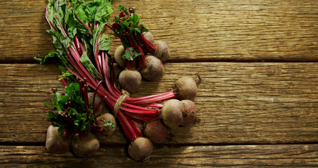 Bunch of Fresh Beetroots on Rustic Wooden Table - Free Images, Stock Photos and Pictures on Pikwizard.com