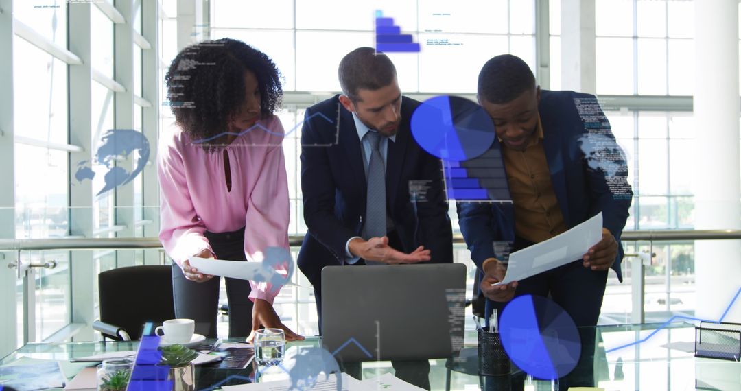 Diverse Business Team Analyzing Financial Data Reports in Modern Office