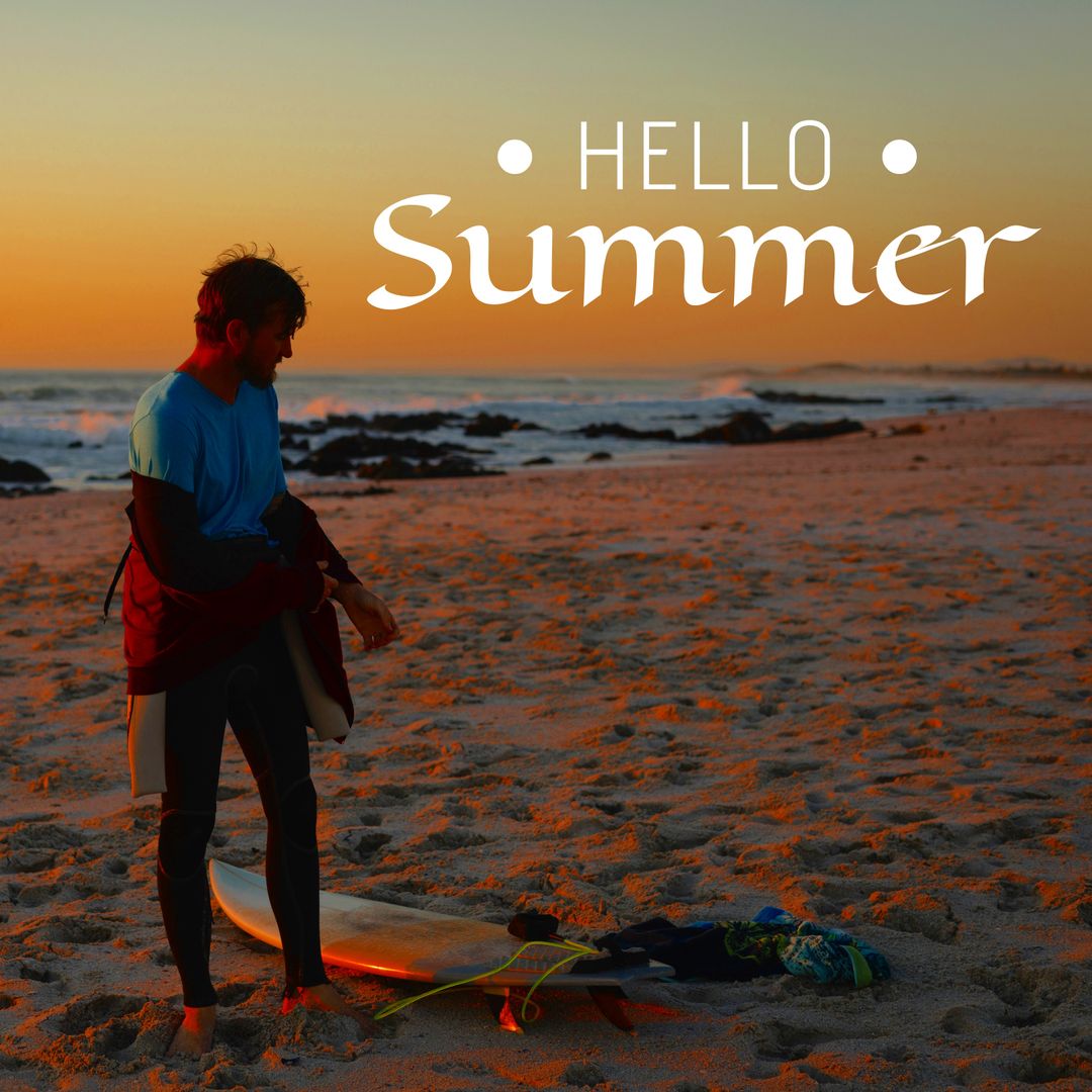 Surfer Embracing Summer Sunset on Beach