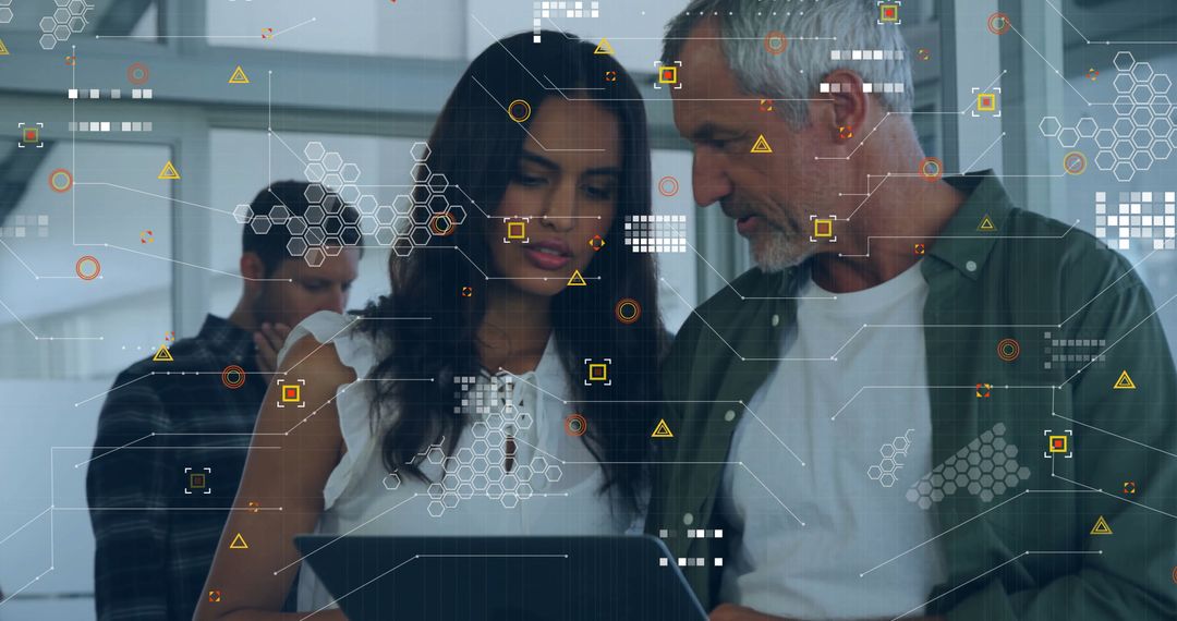 Colleagues Collaborating with Futuristic HUD Interface at Office