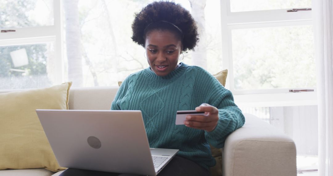 Woman Shopping Online with Credit Card Using Laptop at Home - Free Images, Stock Photos and Pictures on Pikwizard.com