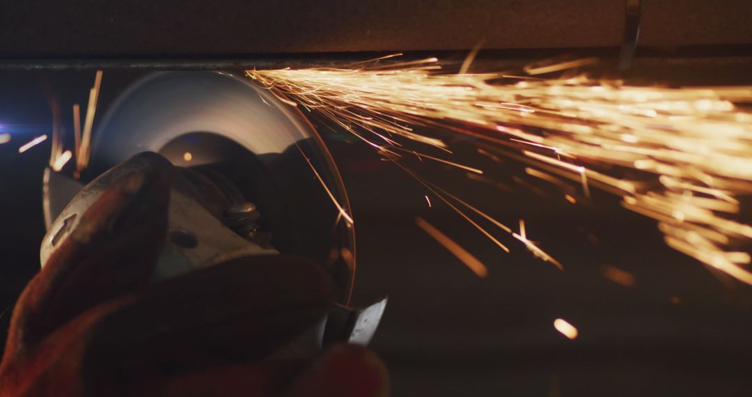 Steel Pipe Cutting with Angle Grinder and Sparks in Workshop