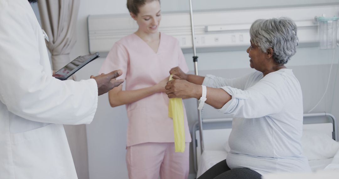 Senior Woman Doing Physical Therapy Exercises with Nurse and Doctor - Free Images, Stock Photos and Pictures on Pikwizard.com