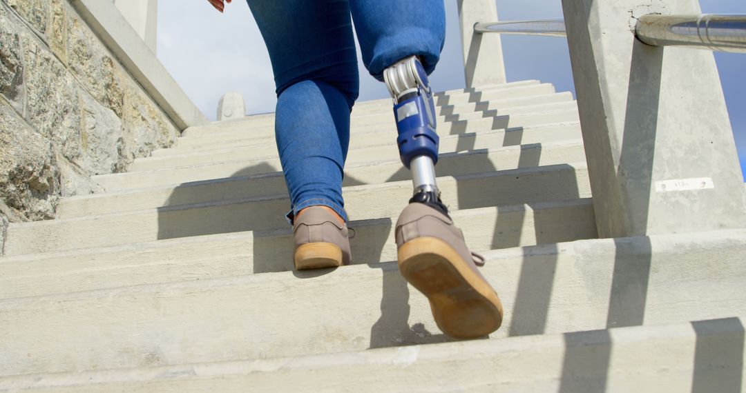 Person with Prosthetic Leg Climbing Stairs Outdoors - Free Images, Stock Photos and Pictures on Pikwizard.com