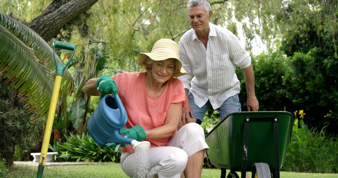 Senior Couple Enjoying Gardening Together in Lush Backyard - Free Images, Stock Photos and Pictures on Pikwizard.com