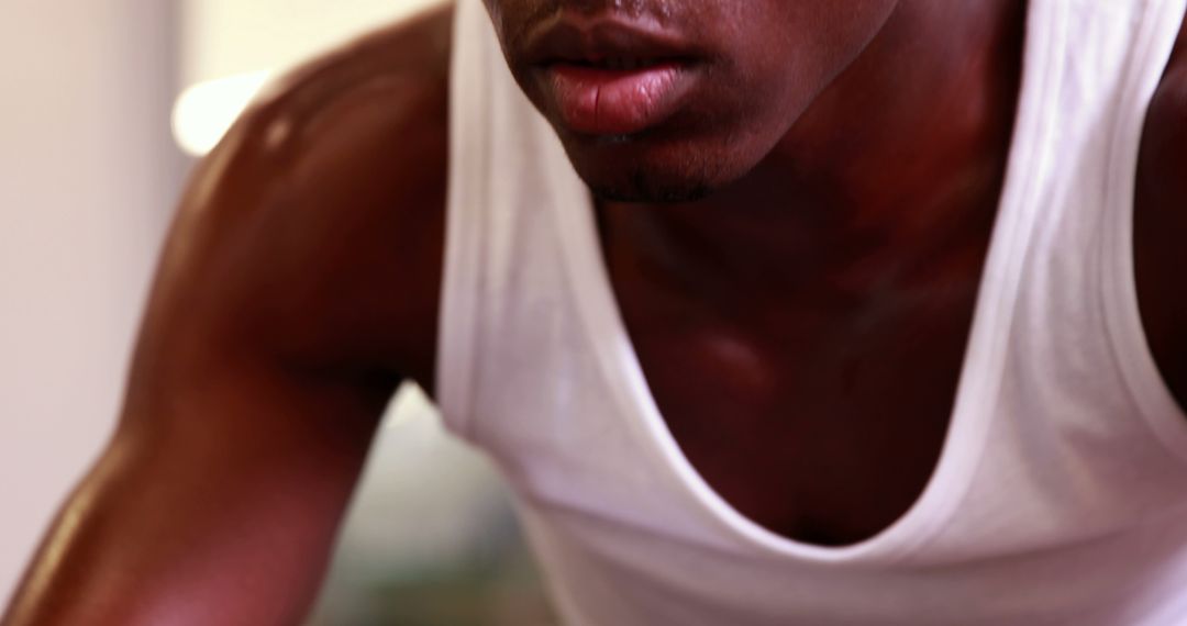 Close-up of Fit Man Working Out in White Tank Top - Free Images, Stock Photos and Pictures on Pikwizard.com