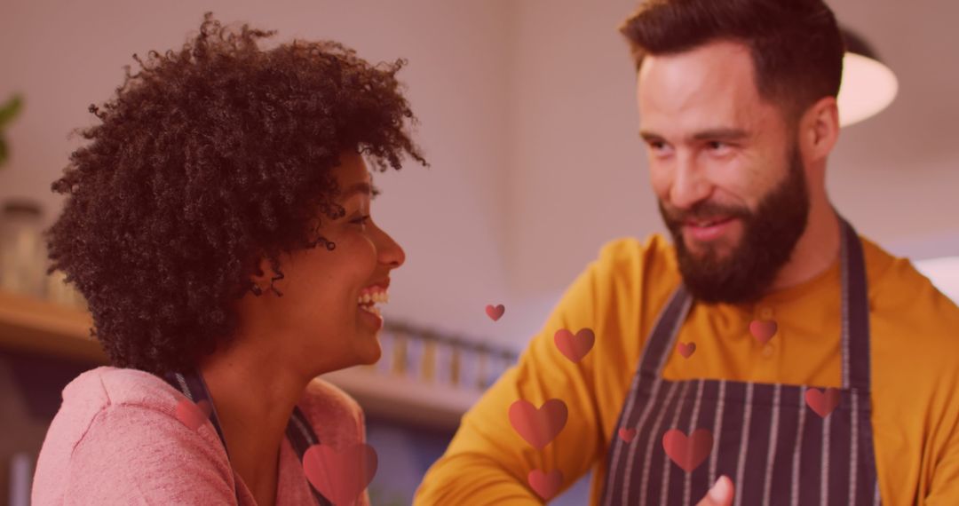 Happy Couple Cooking Together With Floating Hearts