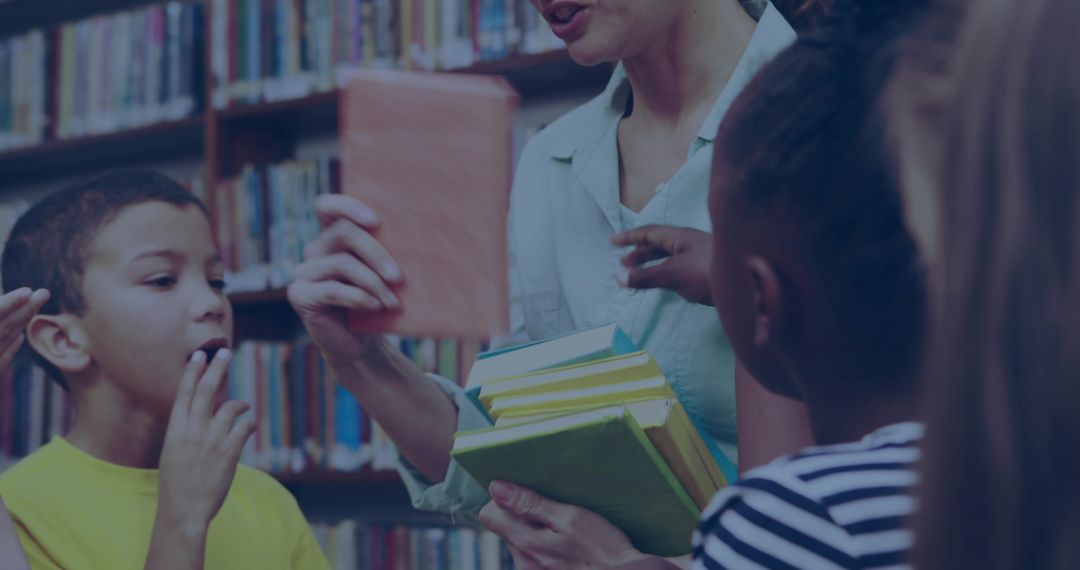 Librarian Sharing Books with Enthusiastic Children in Library