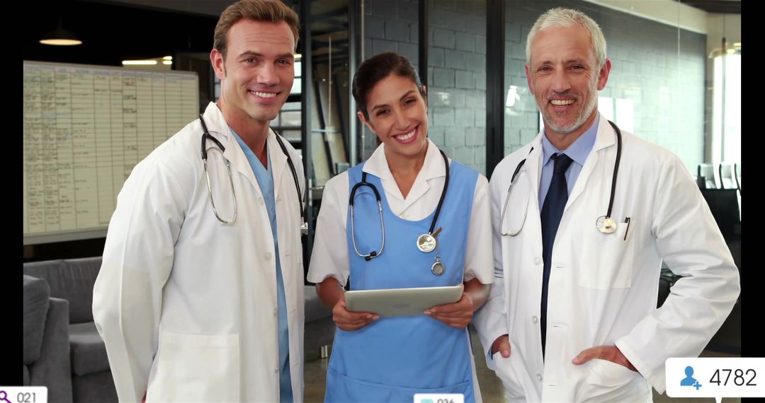 Healthcare Team Smiling and Collaborating with Digital Tablet