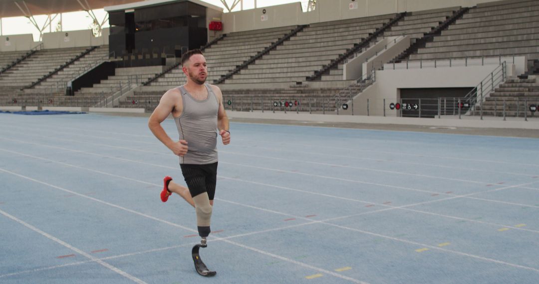 Caucasian disabled male athlete with running blade training and running - Free Images, Stock Photos and Pictures on Pikwizard.com