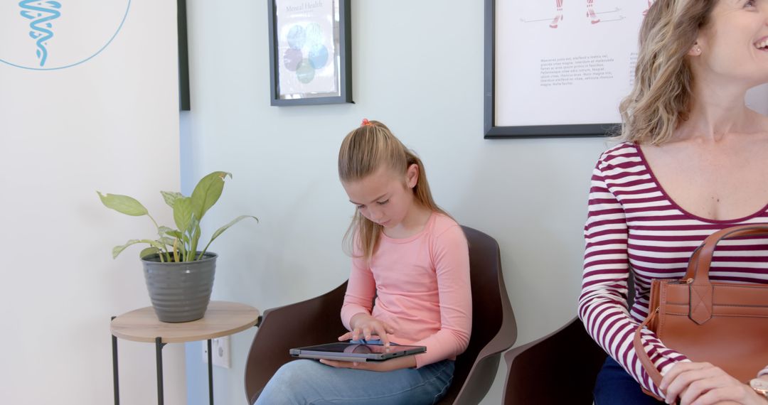 Young Girl Using Tablet in Doctor's Waiting Room - Free Images, Stock Photos and Pictures on Pikwizard.com