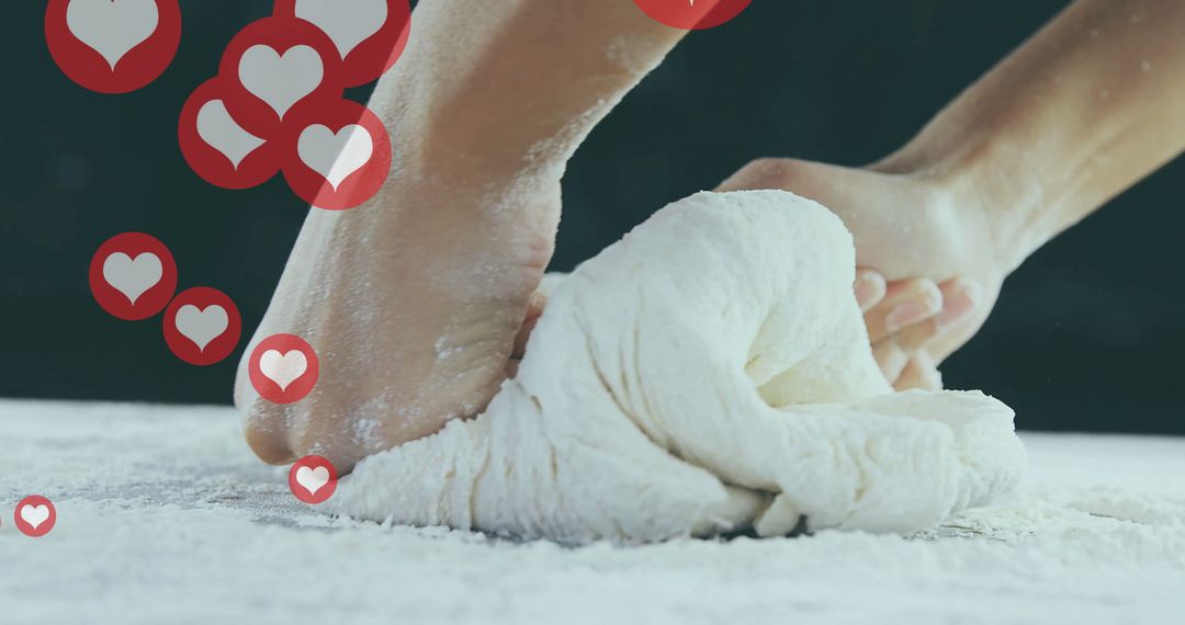 Hands Kneading Dough with Heart Icons Overlay