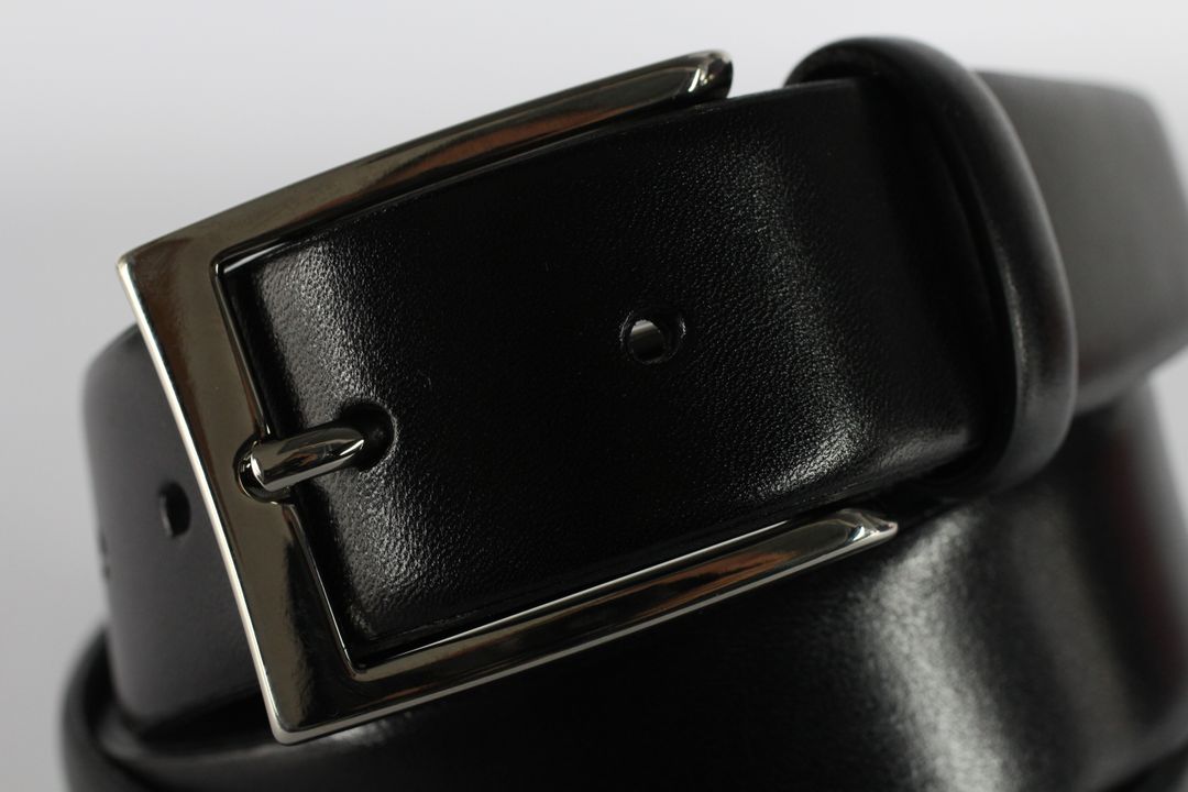 Close-up of Black Leather Belt and Metal Buckle - Free Images, Stock Photos and Pictures on Pikwizard.com